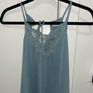 Loose fitting blue tank